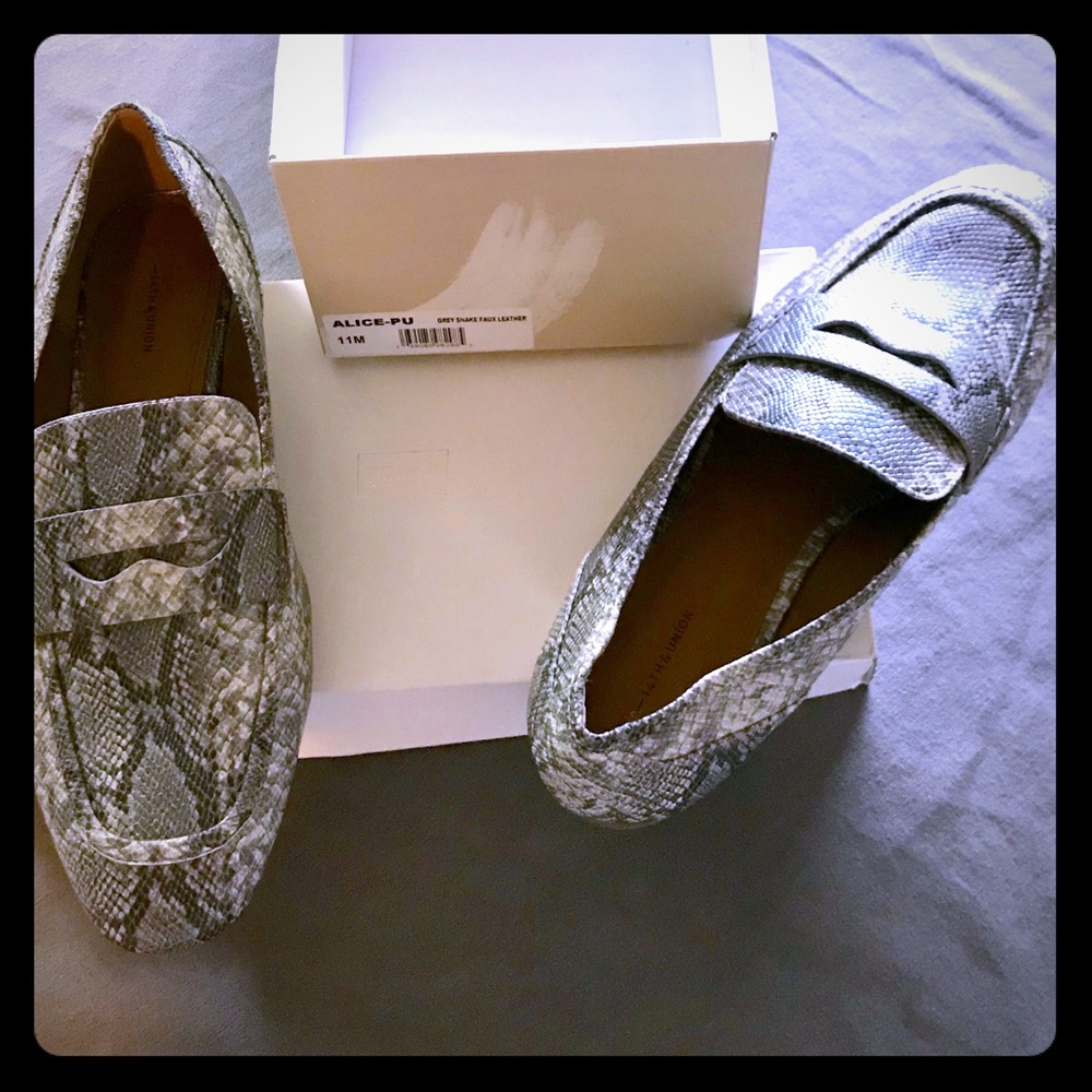 Snake skin embossed, faux leather loafers.